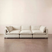 cream colorad sectional sofa in a modualr pit configuration