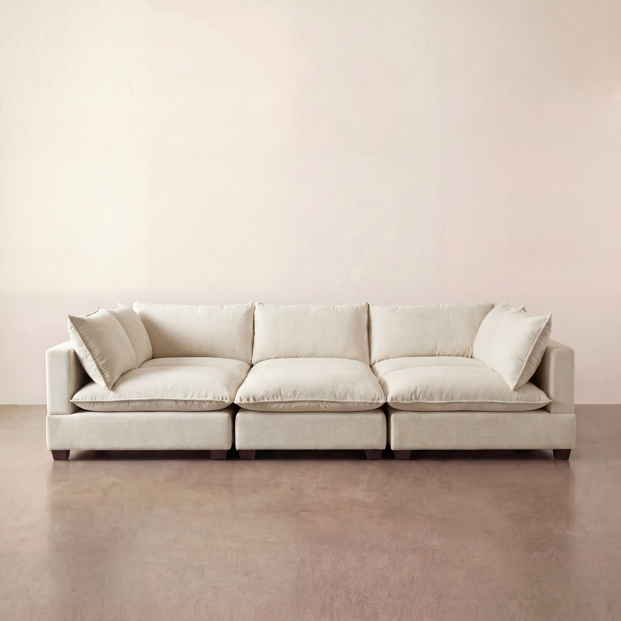 cream colorad sectional sofa in a modualr pit configuration