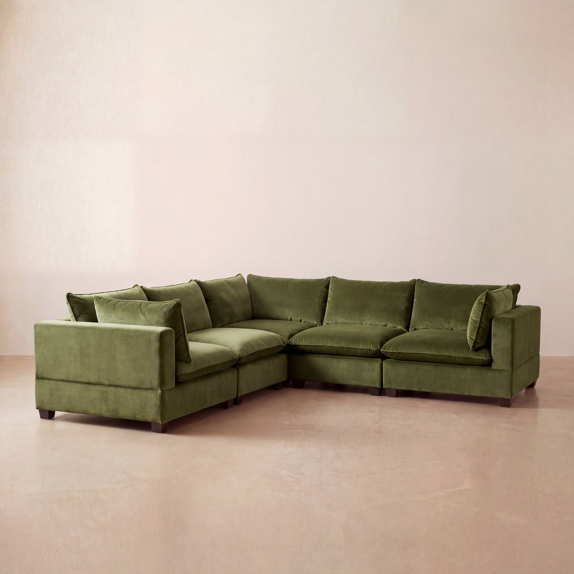 Olive green modular sectional cloud sofa in modern room