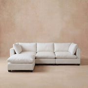 cream colored modular sectional sofa with the cloud couch design